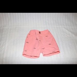 Baby boys peach car print shorts.